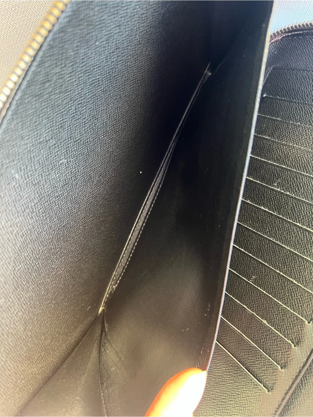Louis Vuitton Taiga leather Atoll travel organizer in black